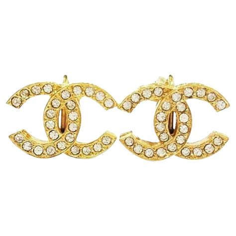 chanel gold plated earrings|chanel cc earrings original.